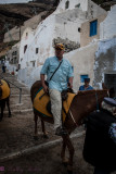 Riding Donkeys up hill in Santorini