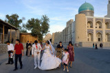 Bukhara, grooms and Mir-i-Arab Medressa