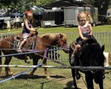 LOOK AT THAT FACE!!!! TEAGAN WANTED TO TAKE THE PONY HOME.........