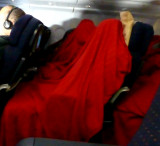 Passengers Sleeping on the Plane