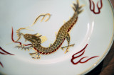 Golden Dragon On The Plate