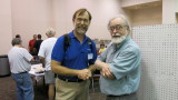 Bruce Smith, left, and John Spencer, right