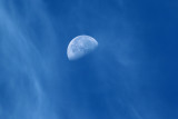 Moon with wisps of clouds