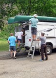 Loading the Canoes on Evans Camper