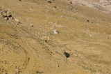 down the slopes we see many bedouin camps