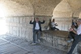 Singing under the arches of the bridge in Esfahan
