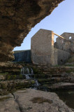 Restos del molino y arroyo