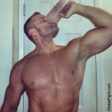muscle dude drinking power shake.jpg