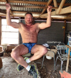 hairy muscleman hanging rafters.jpg