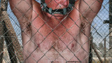 prison fight cage match.jpg