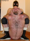 wrestler beating up his opponent.jpg