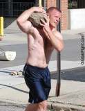 muscleman carrying rocks boulder.jpg
