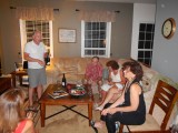 Doug sells more wine to the crowd.