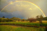 rainbow over mountain valley web.jpg