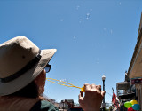 Blowing bubbles on Main St., Bastrop, TX