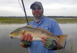 Cary B. with his !st Grass Redfish