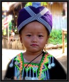 A Young Hmong Girl in Traditional Costume. North Laos.