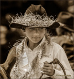 Young Paniolo with Lei Hinahina