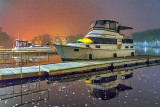 Docked Boats Under Foggy Night Sky 35164
