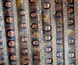 Paintings of angels heads on the ceiling of Debre Berhan Selassie Church in Gondar. Ethiopia.