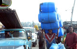 Transport of plastic barrels in a street of Addis Ababa. Ethiopia.