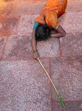 Devotees that have made vows circle round the temple and prostrate every few metres,Yellamma temple,Saundatti,Karnataka, India.