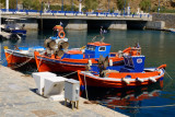 small boats docked in the New Port