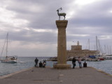 ...he had one foot on each side of the harbor entrance.