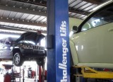 cars lifted to diagnose and repair.jpg