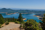 Looking southeast.  Shasta Lake and dam.  Mt. Lassen in left background.