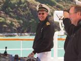 Captain Guss at the helm in Tracy Arm
