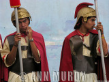 Roman soldiers against blue wall