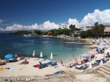 View of beach in Ksamil, Albania with fluffy clouds