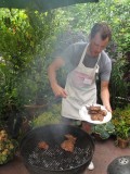 Eric grilling pork for Northeastern-Style Charcoal-Grilled Pork Salad (Lahb Moo Yahng)