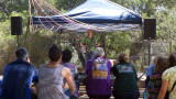 Erin Inglish and banjo at the kids  area stage