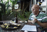 Robert Ecksel eating oysters Gilhooly