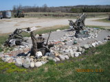 Rock Garden/Tree Stump Junk Left on Property