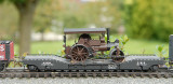 Steam Road Roller on flat wagon.