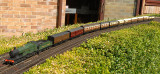 Armstrong 4171 with the suburban train passing the loop.