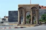 Replica of a Roman arch at the entry to the town of Ain Yagout