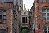 Blinde-Ezelstraat with the small bridge connecting the City Hall and the Courthouse, Bruges