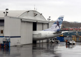 Tail of a First Air B737-400 (C-FFNC) sticking out of the hanger in Iqaluit