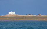 Whitewashed shrine on the spit of land separating the Port of Berbera from the Gulf of Aden