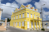 A bright yellow restored building for rent, Otrabanda