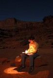 Updating my journal under the stars and moon