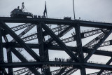 Bridge climbers on two levels