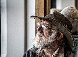 Man in hat on ferry