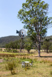 Australian paddock with windmill for drawing water