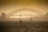 Sydney in mist with tallship and yacht