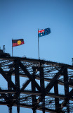 Aboriginal flag and Australian flag on top of Harbour Bridge